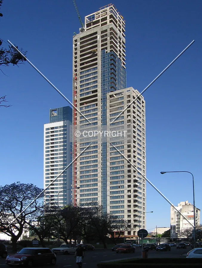 The curtain wall rises