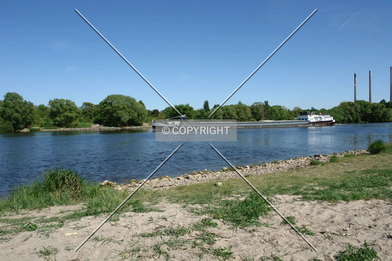 A cargo ship on a river