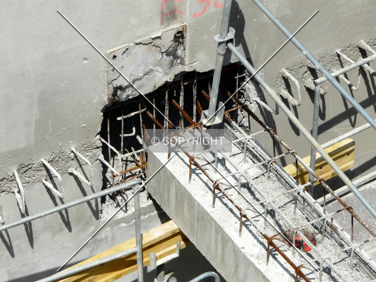 Hole in the slurry wall for a precast concrete beam
