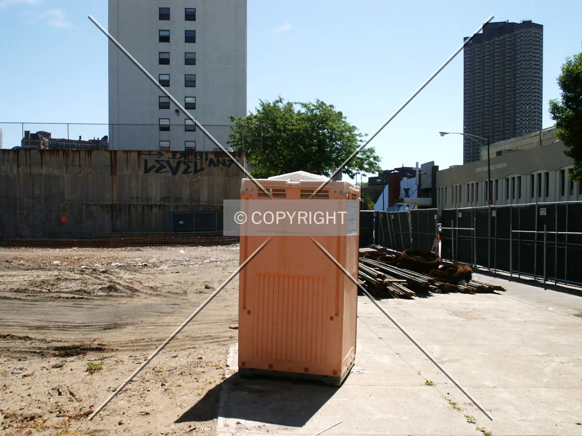 Looking east along Grace Street inside the fence