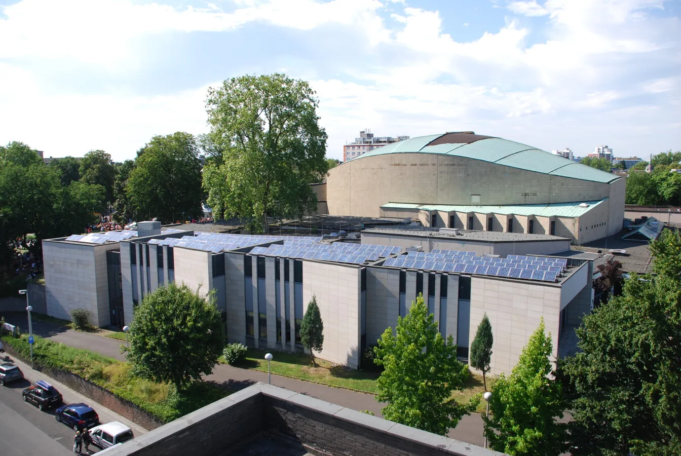 Full rows of solar panels at work on the roof