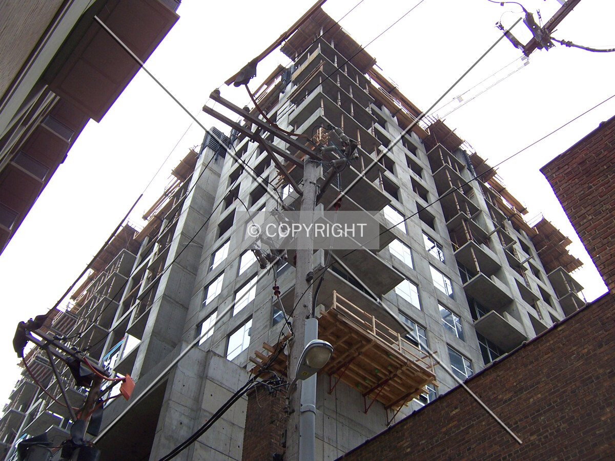 Looking up the northeast corner from the alley located mid-block between Michigan and Indiana Avenues