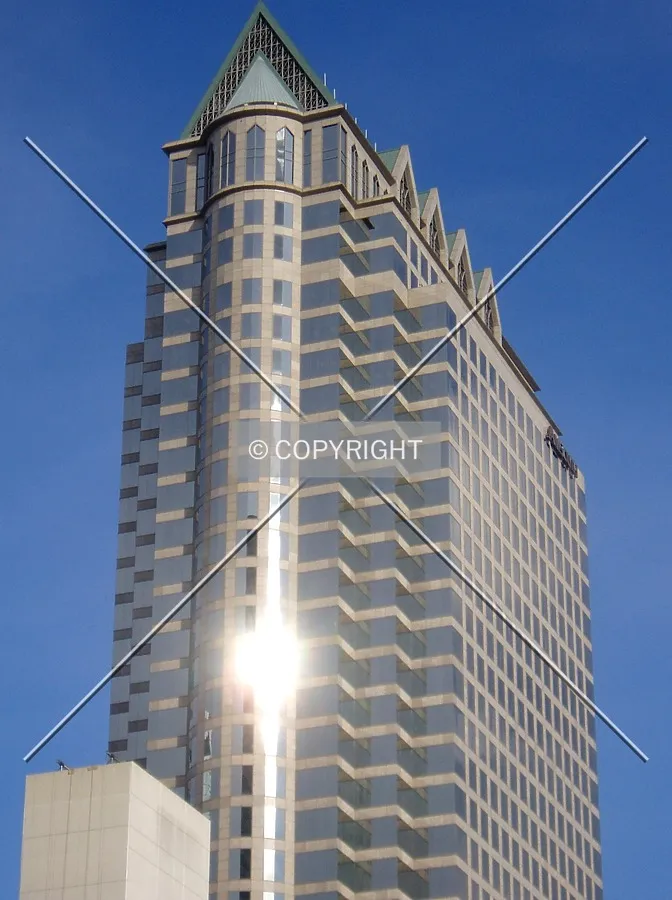 Sun reflects off the angled top, seen here from the northwest