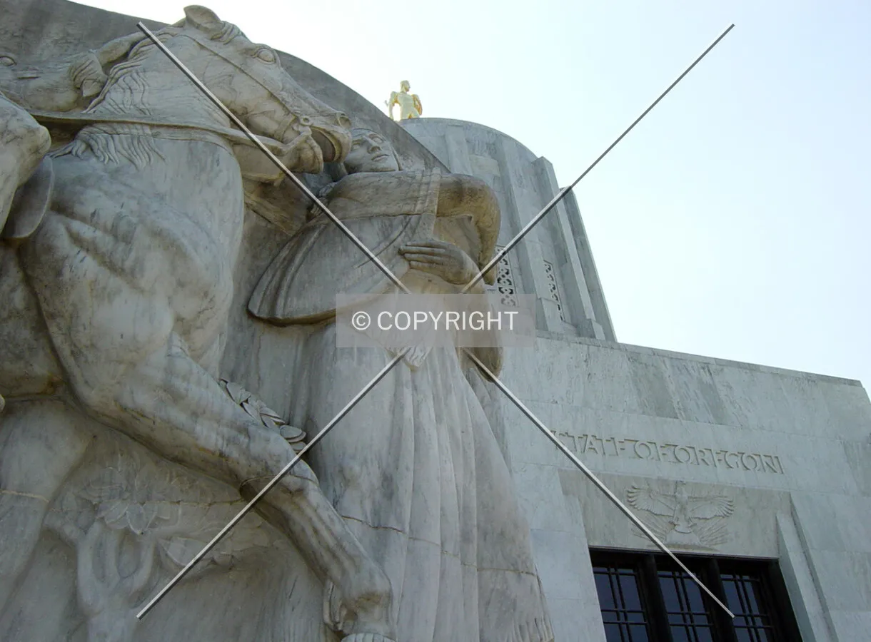 Partial view of Sacajawea leading Lewis and Clark, and the State Capitol building