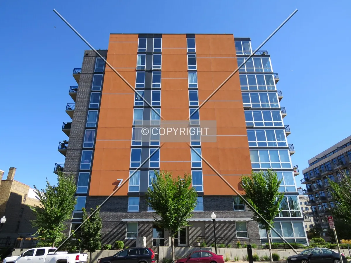 Full front elevation from across 4th Street North