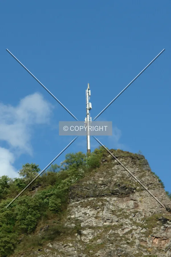 Communication mast on a mountain