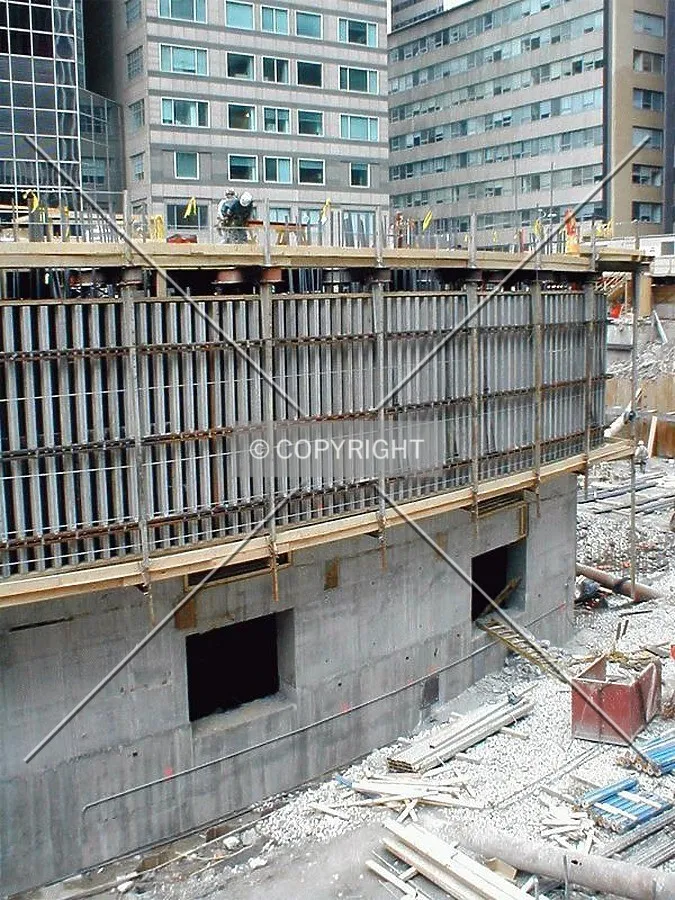 Construction workers atop the core