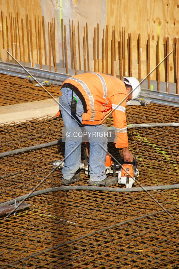 A construction worker doing foundation work