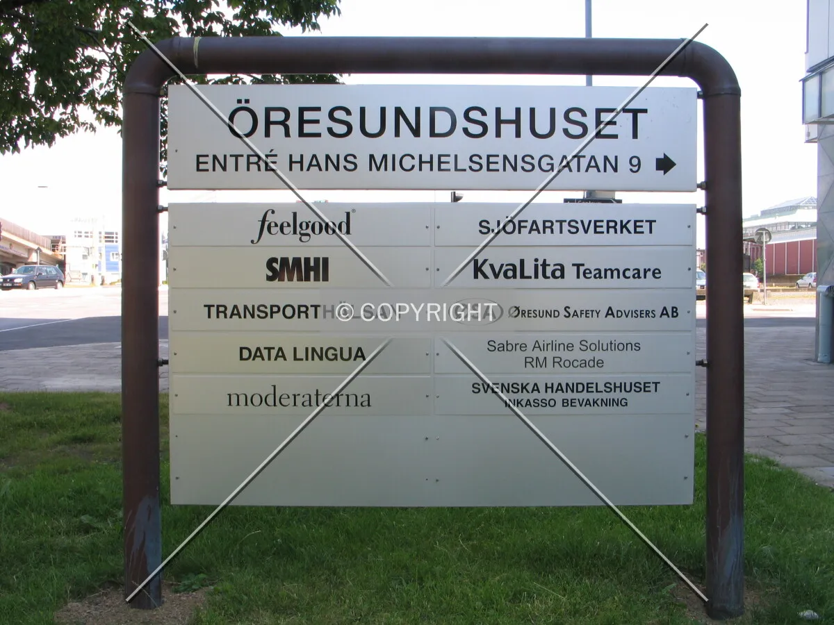 The building sign by the entrance