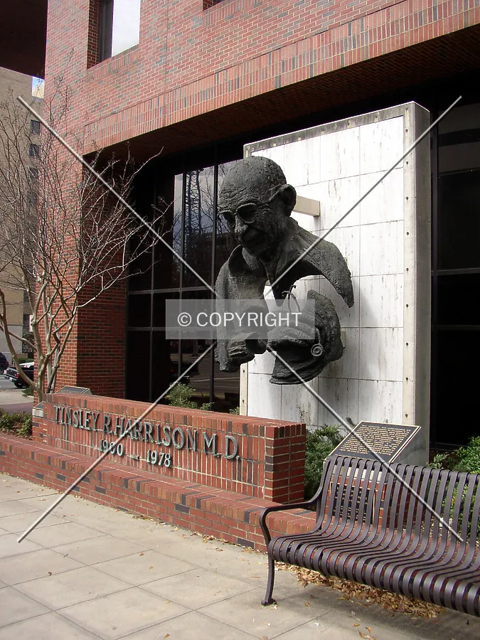 Main signage and bust of Tinsley Harrison off University Boulevard