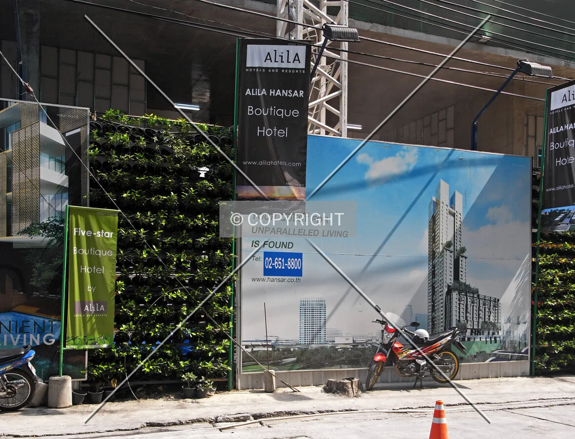 Project information displayed on the construction site fence in Soi Mahatlek Luang 3