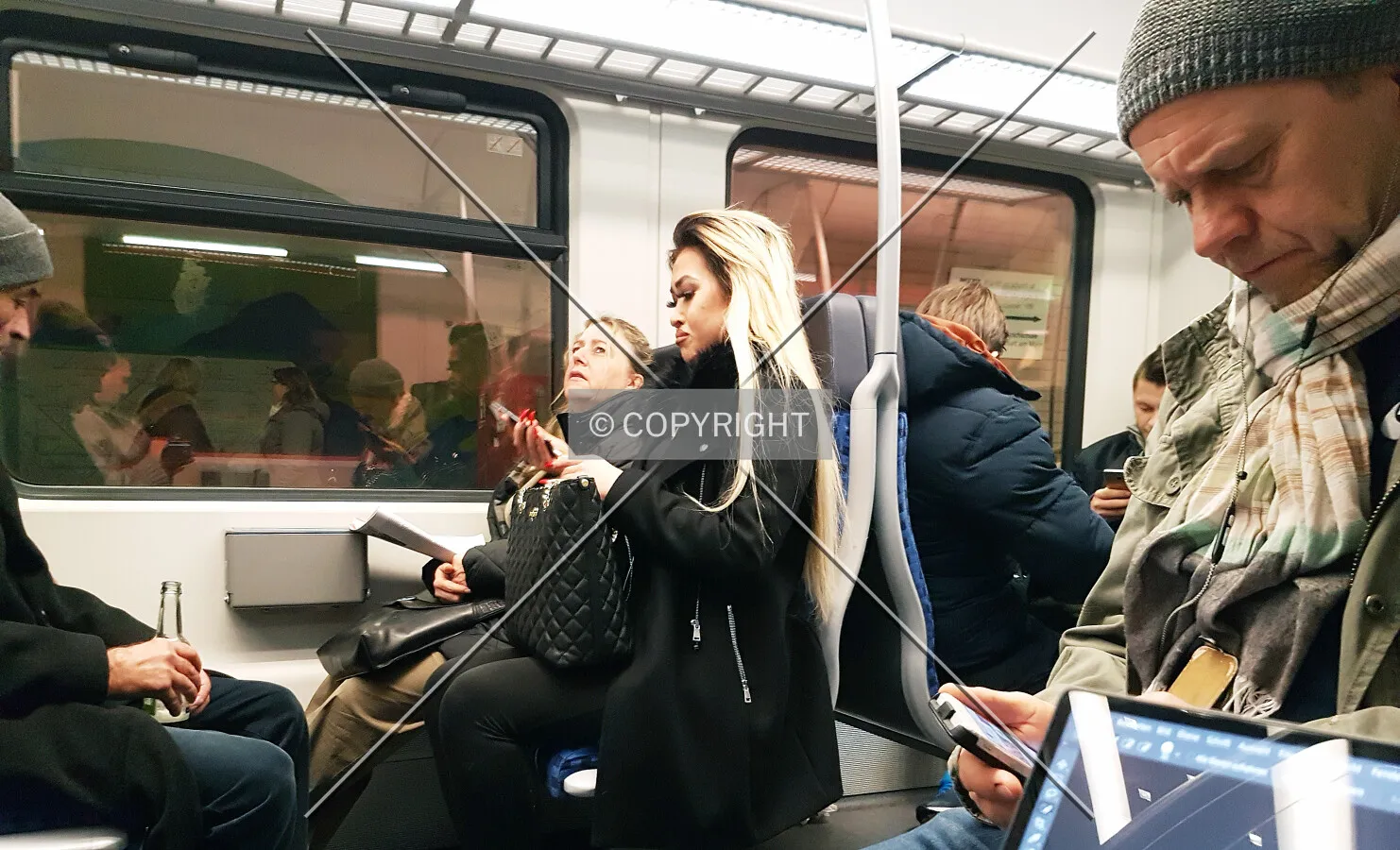 People riding in an S-Bahn train