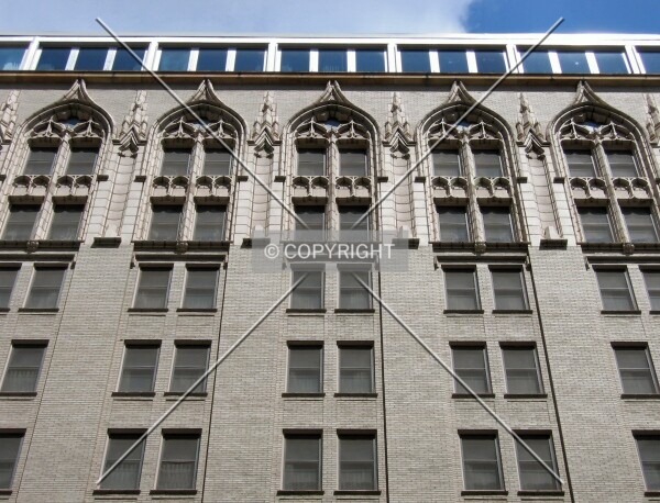 Looking up the south facade from 1st Street SW
