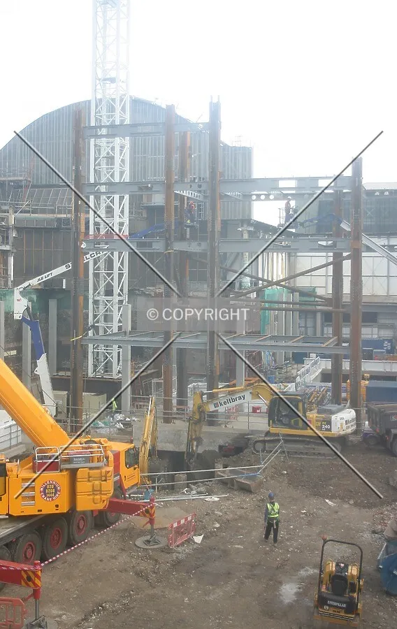 Elevated view east showing the emerging steel frame