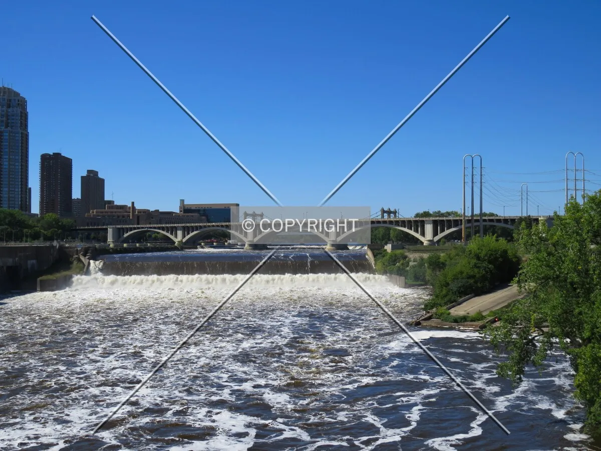 View upstream past St. Anthony Falls from the Stone Arch Bridge