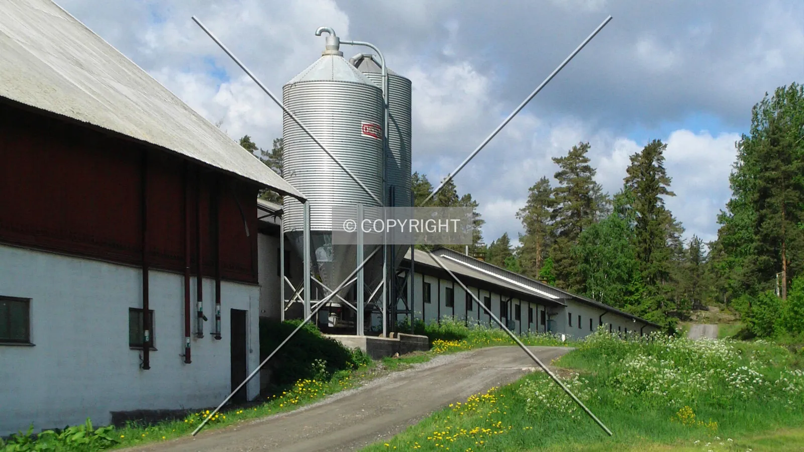A pig farm and a silo