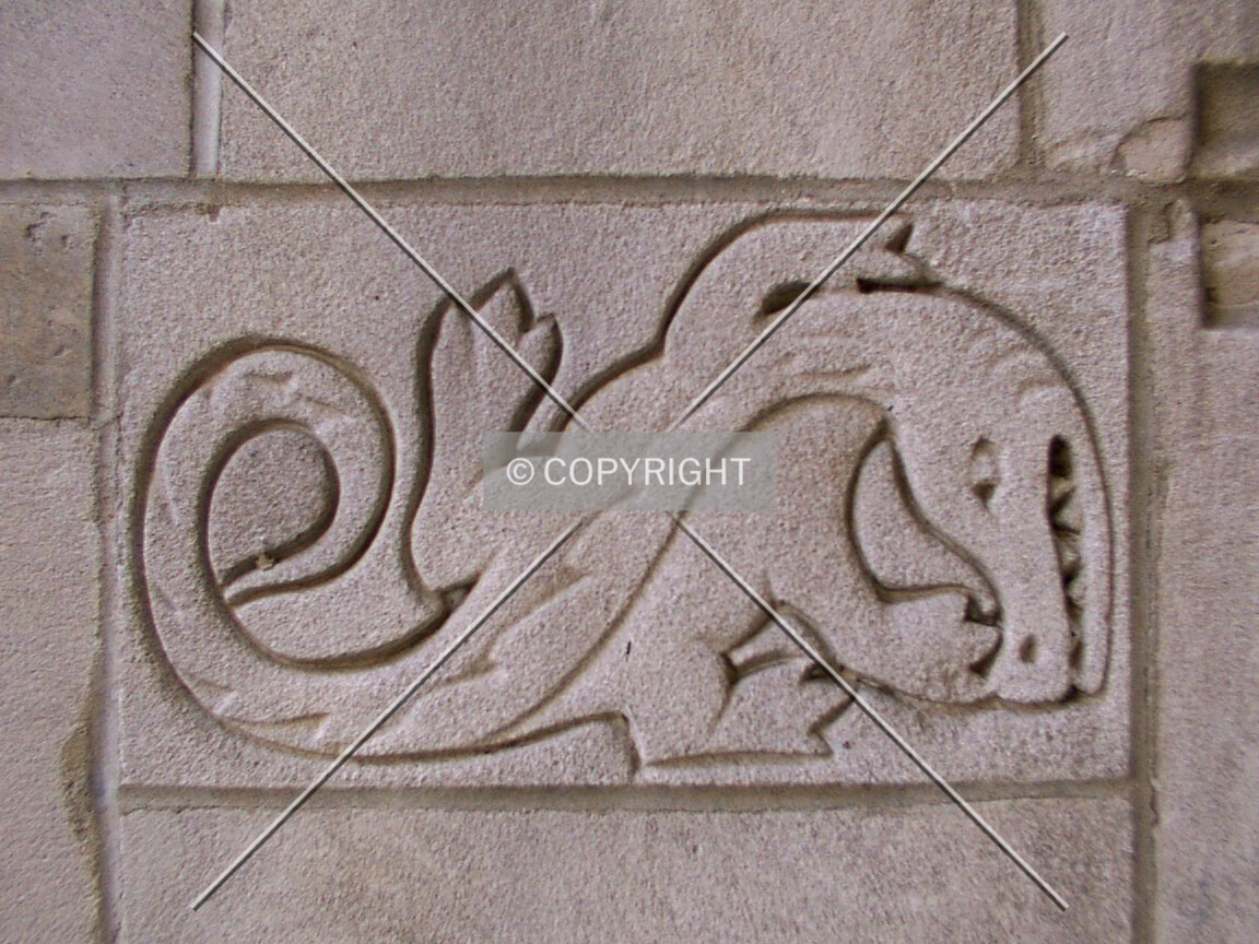 Relief carving on the east facade near ground level
