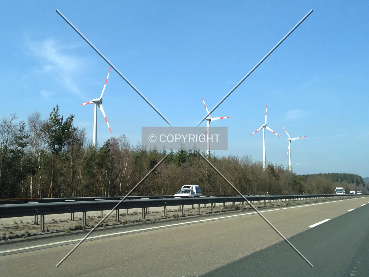 Wind turbines along a highway