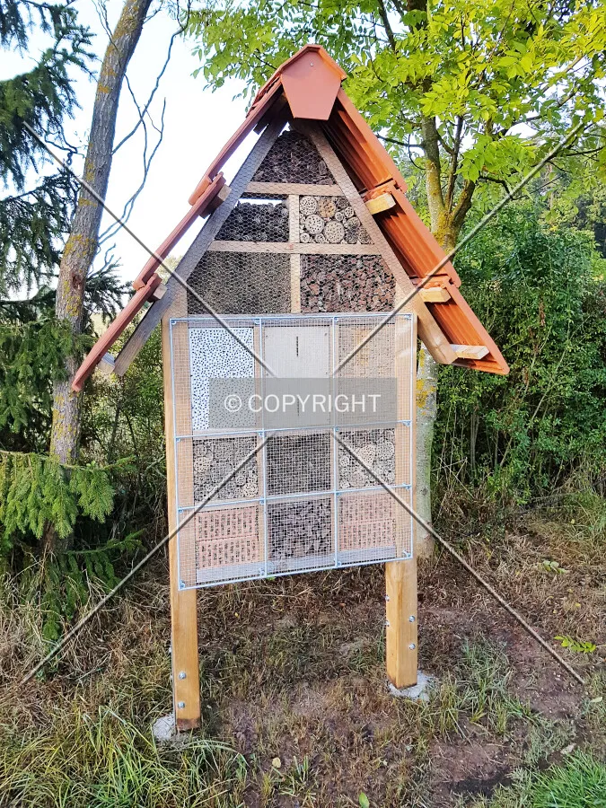 Insect hotel - a manmade structure created from natural materials intended to provide shelter for insects