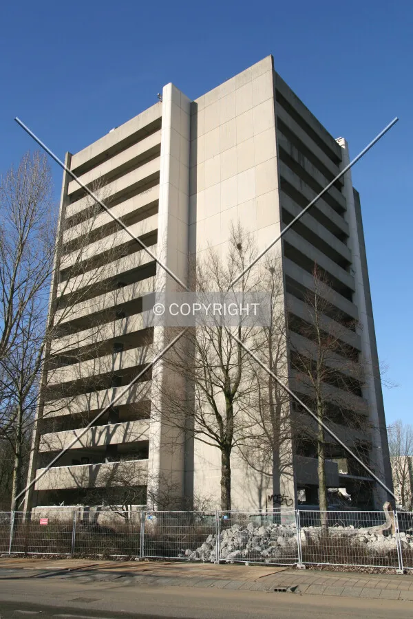 The stripped building before its demolition