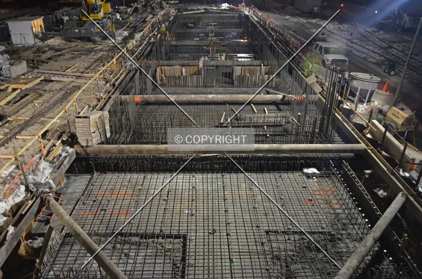 Looking south From Lake Street with rebar in the foundation mat shortly before the concrete pour begins; February 13, 2015.