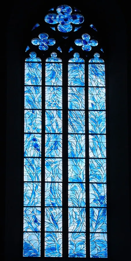 Stained glass window on the side of the main hallway