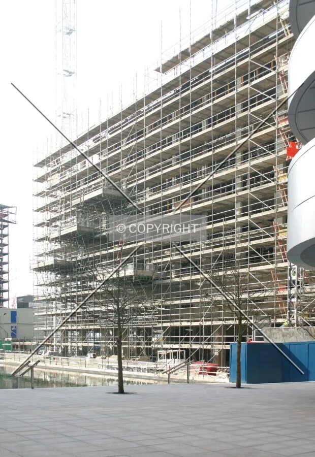 View northwest of the scaffold-clad frame