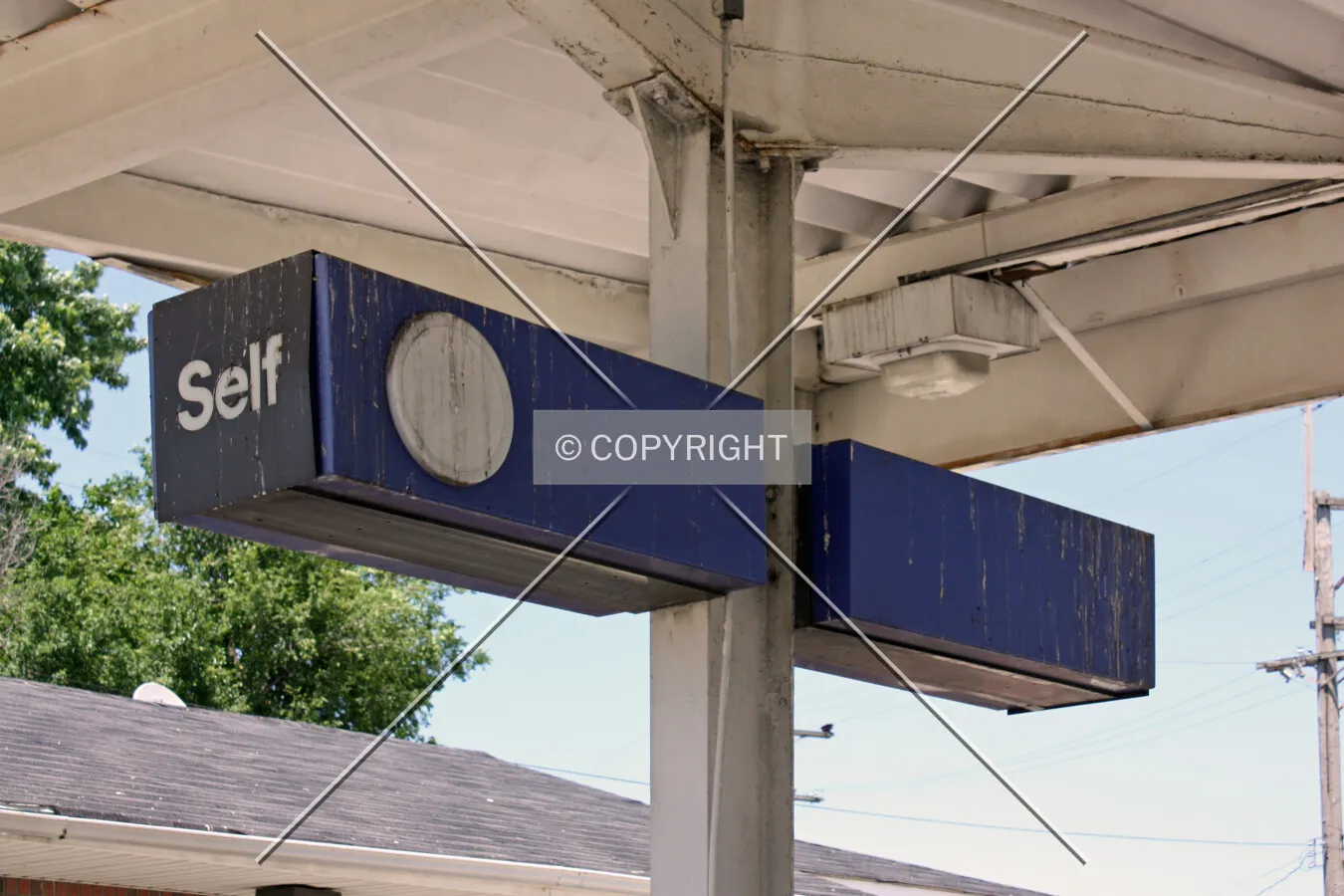 Sign above the gas pumps; May 22, 2010