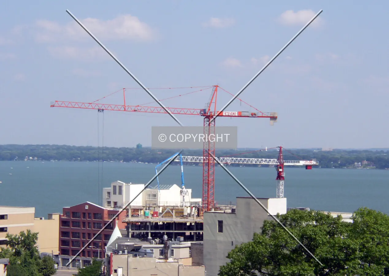 Cranes rise above Lake Monona as construction continues