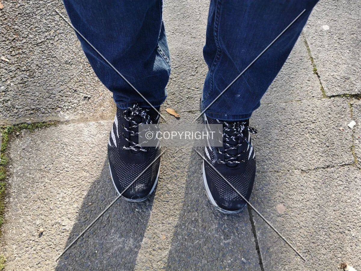 A man wearing security shoes for construction sites