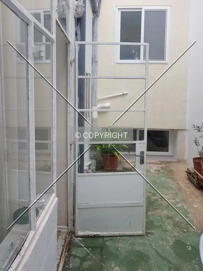 A door leading to a small courtyard