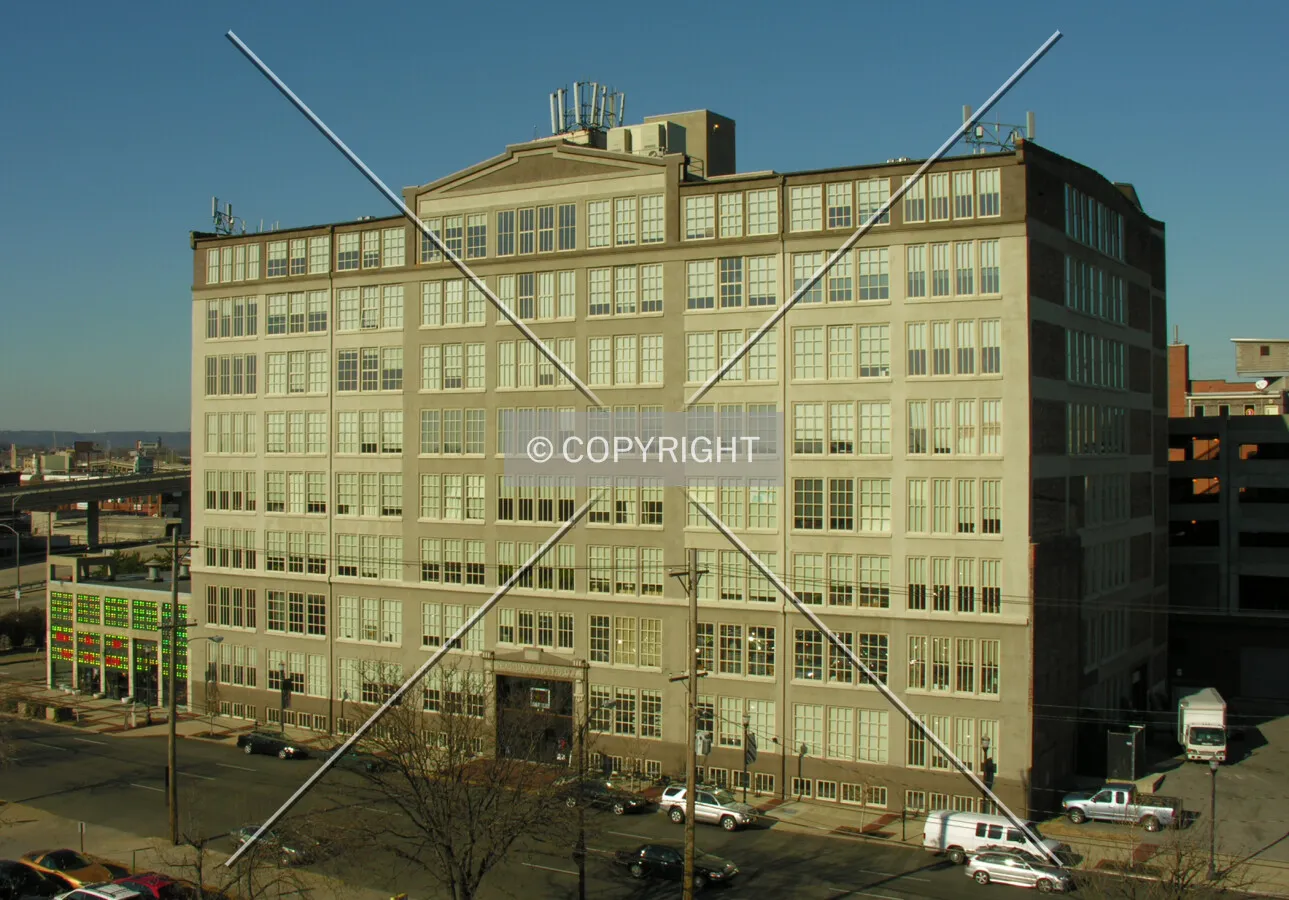 A view of the Glassworks building looking directly across from the outdoor staircase of City Properties