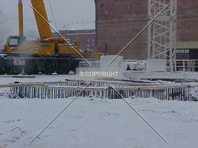 Rebar sticking out of the ground where the elevator core will be