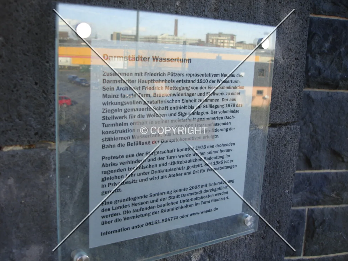 Sign explaining the history of the building