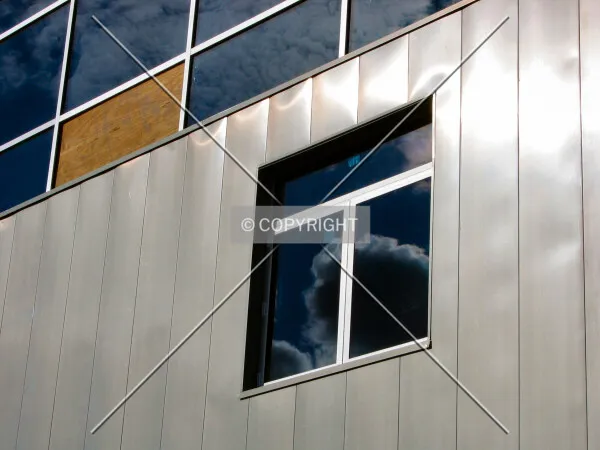Zinc, glass, and plywood