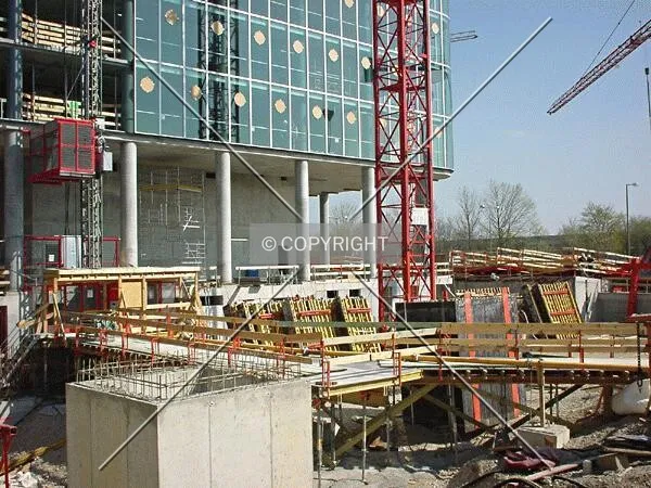 At the base of the tower