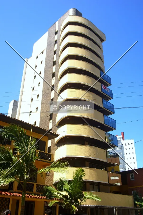 Looking up from across Firmino Paim Street