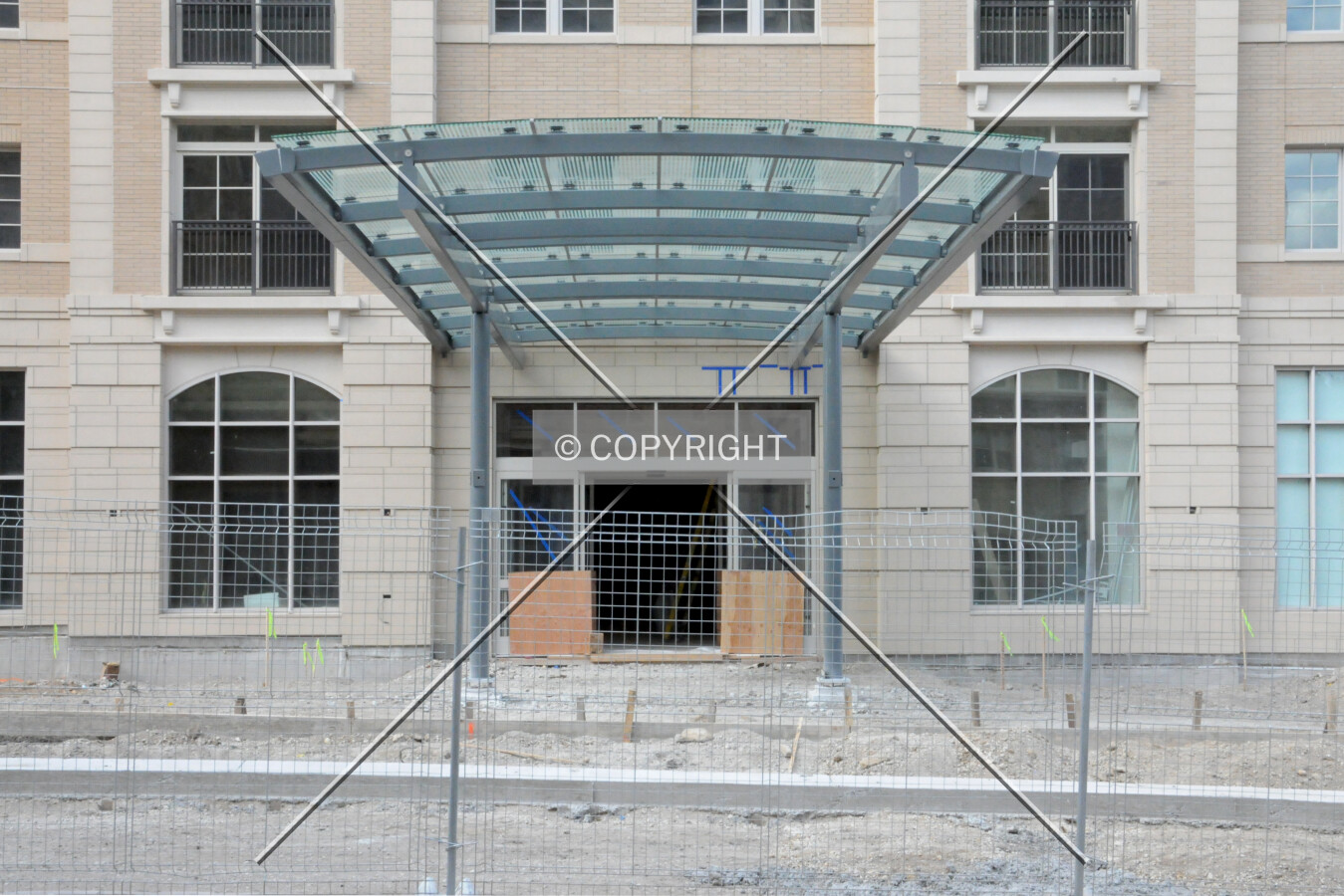 Frontal view of the entrance canopy on Davis Street