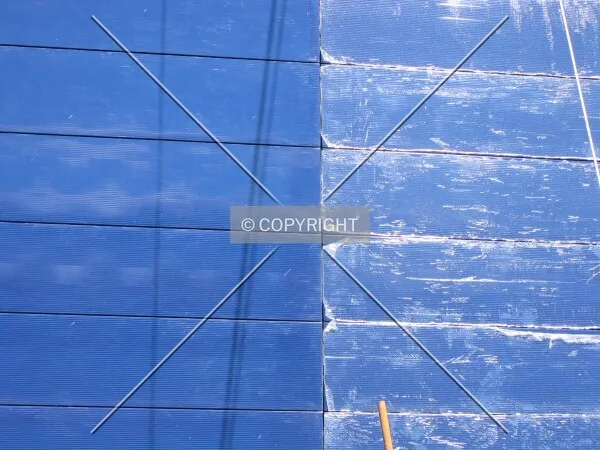 Close-up of new blue facade panels