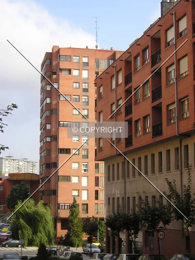 View in comparison with a nearby low-rise building