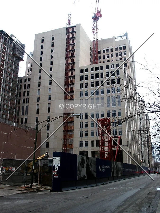 View from the west with demolition beginning on the Carriage House to the left
