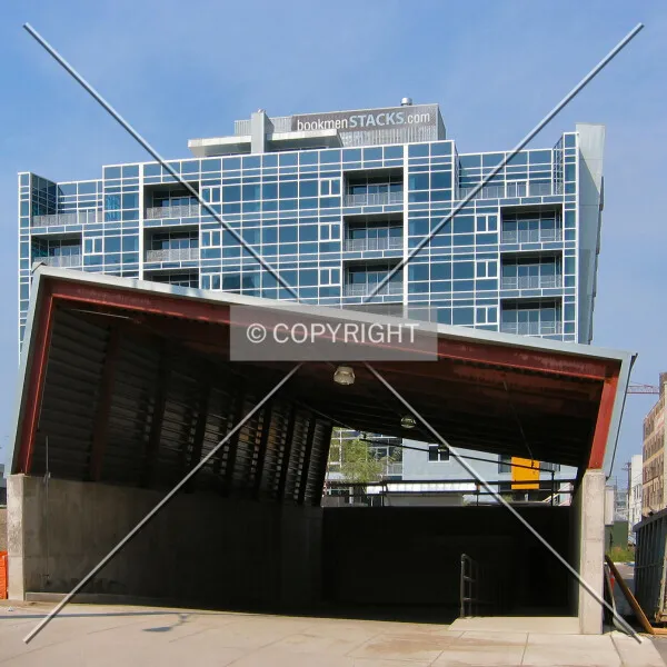 Rising over the garage entrance, from 5th Avenue North
