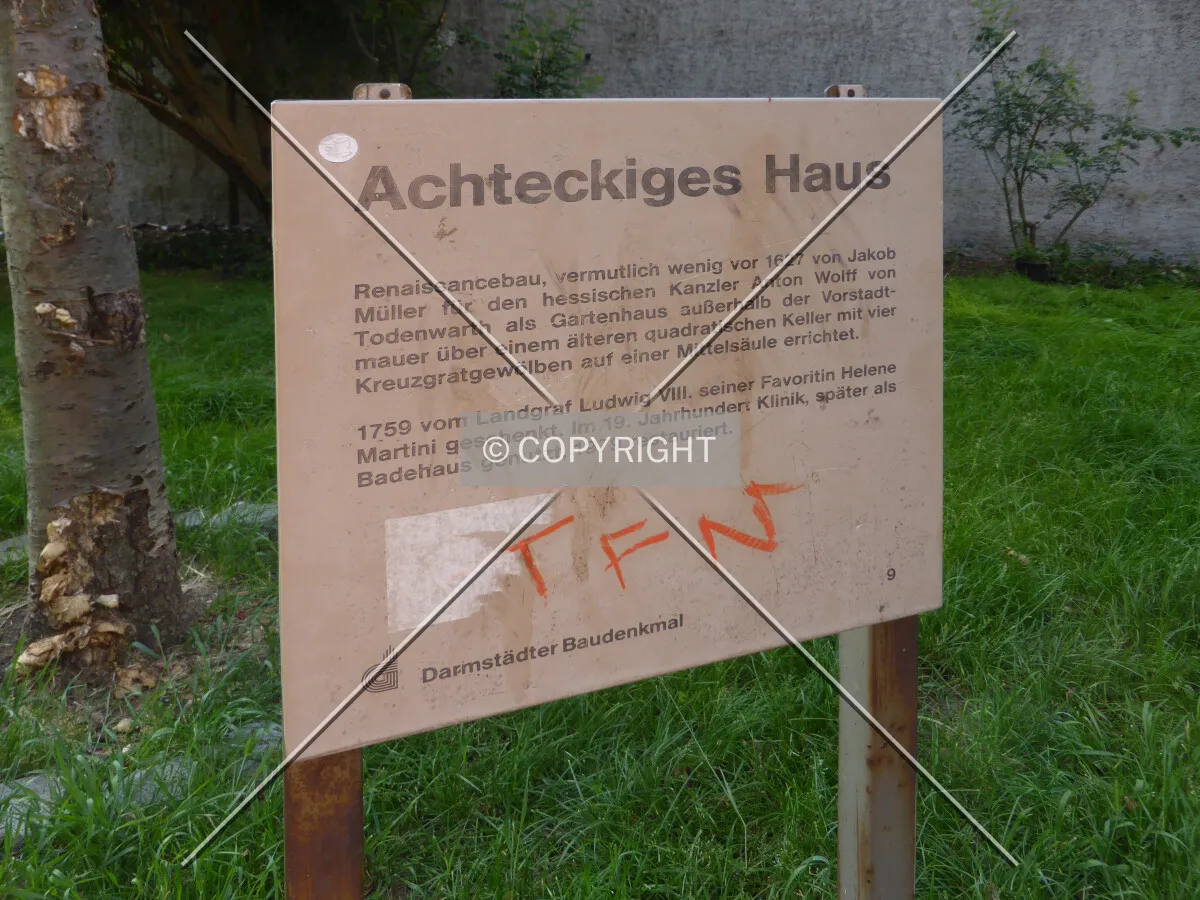 Sign explaining the history of the building