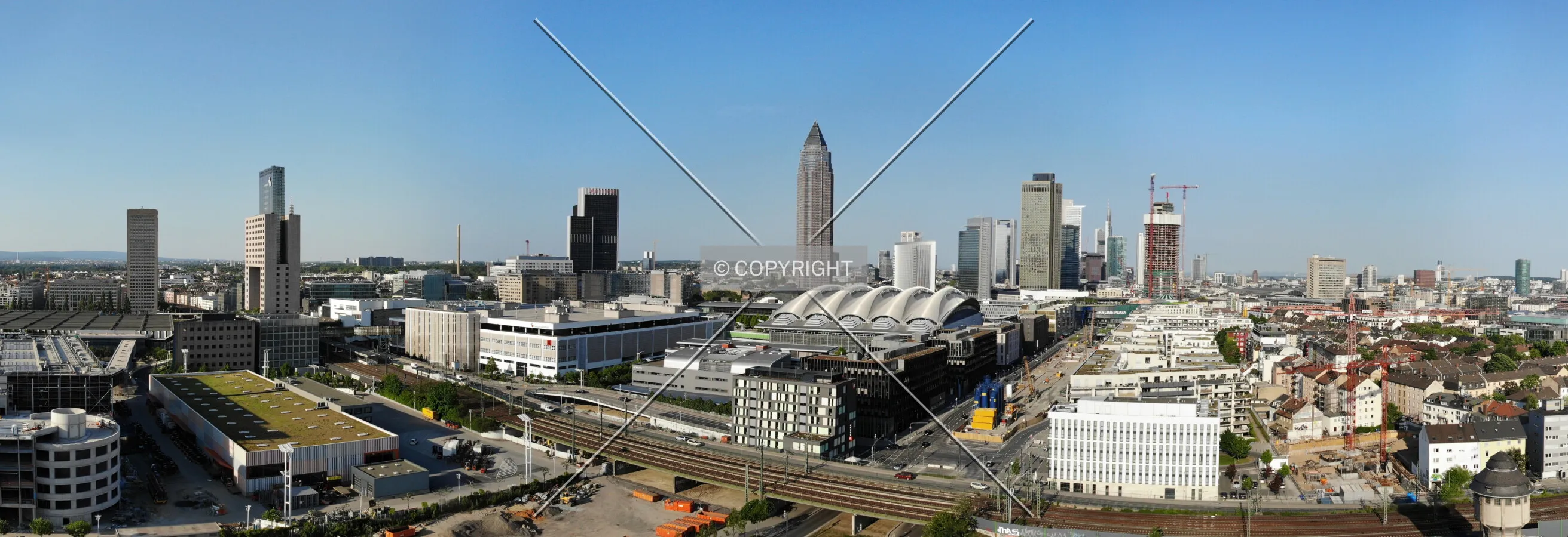 Grand Tower is rising (far background, right side)