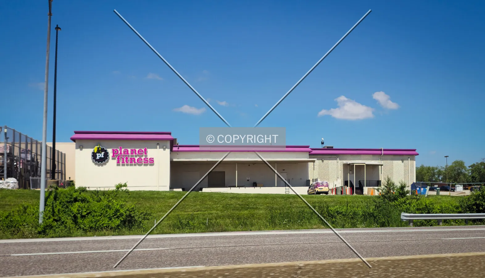Rear of Planet Fitness from Interstate 170, Monday, July 13, 2026