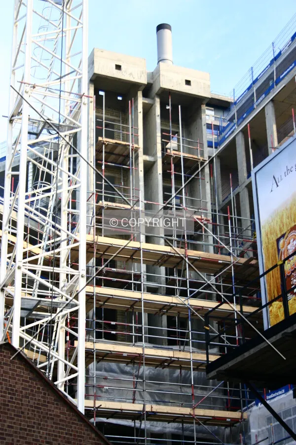 Looking up at the twin concrete shells which will house the scenic elevators from South End Green