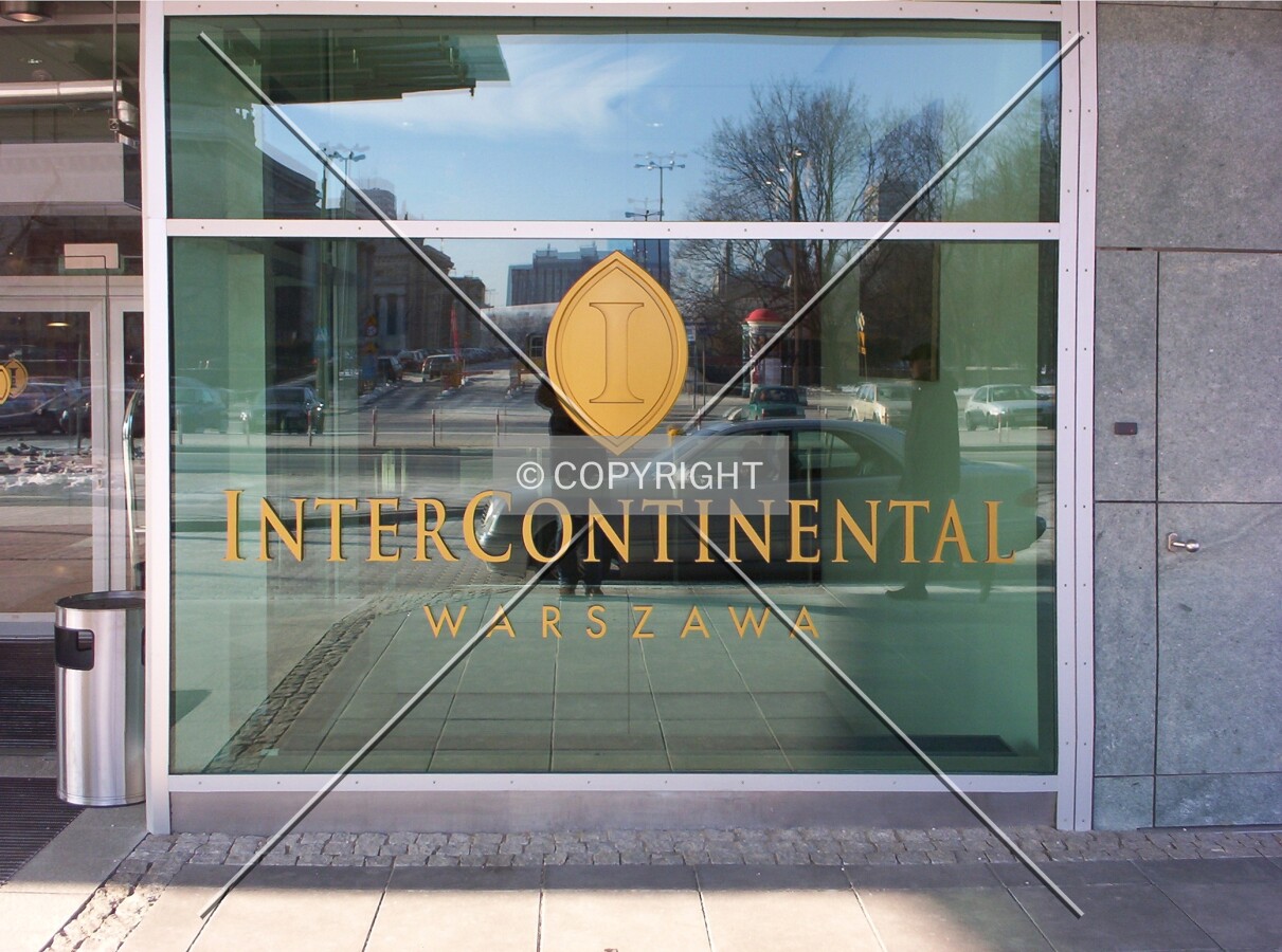 The hotel logo next to the entrance