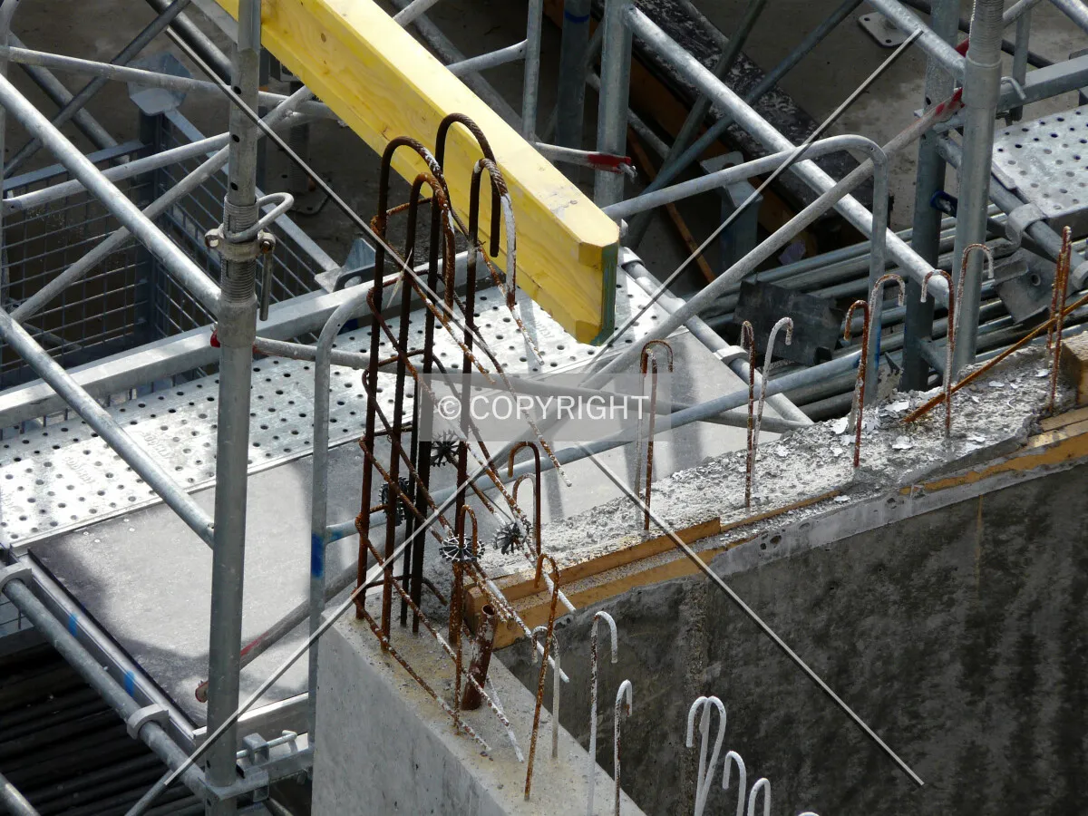 Rebars on top of a wall in the underground floor