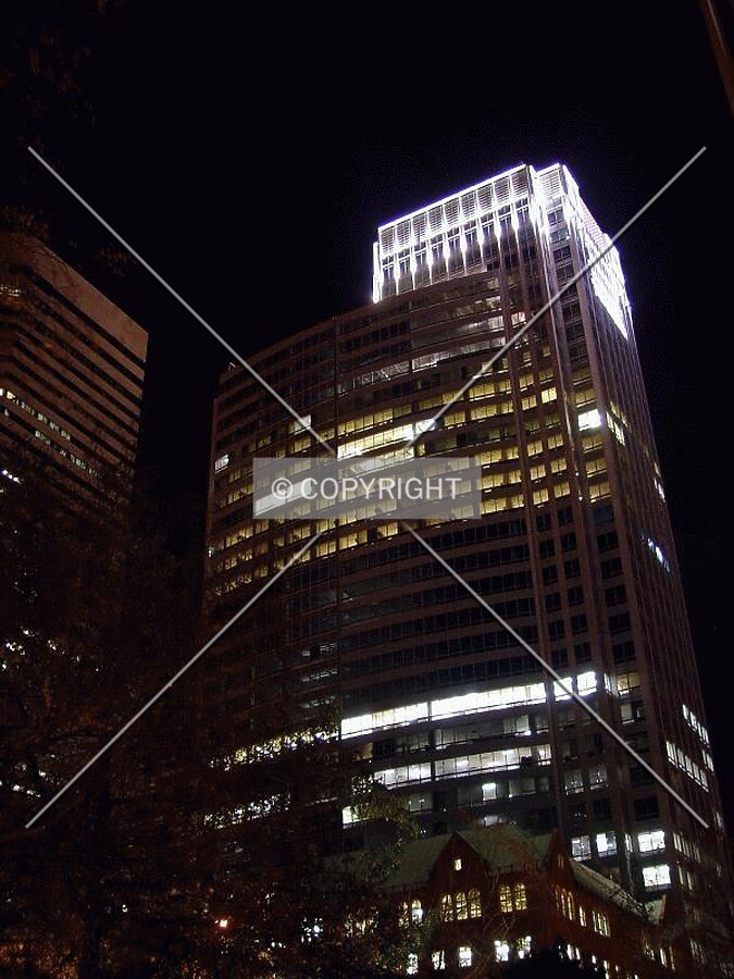Top of the tower illuminated at night