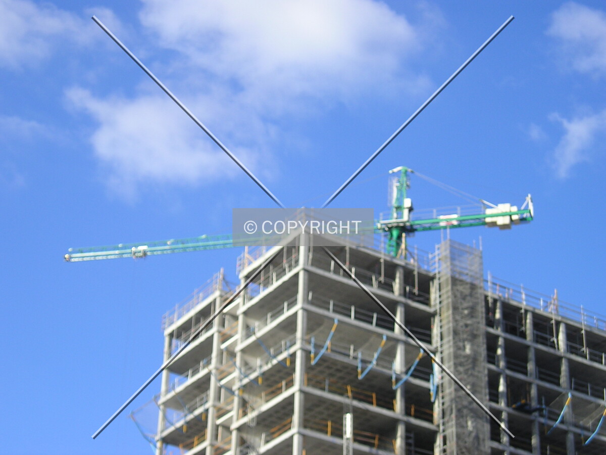 View of the crane at the top of the building